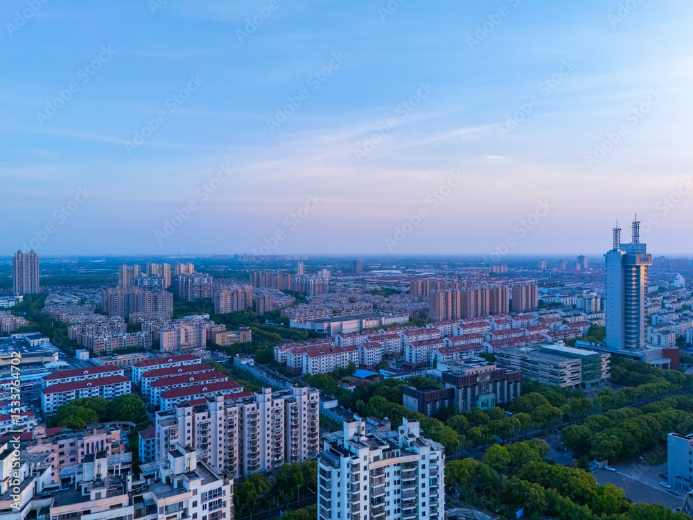 Fototapeta premium Aerial view of urban scenery in the suburbs of Shanghai at sunset.