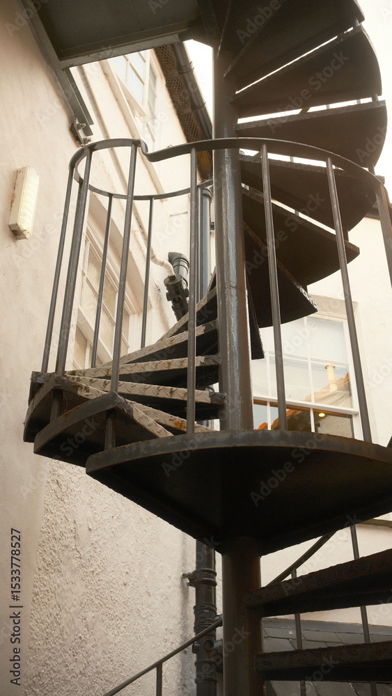 Obraz premium A highly detailed, professional photograph of a chair that is sitting in a room captured with artistic lighting and excellent composition. the scene features under moody and dramatic conditions.