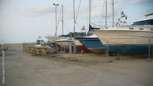 This photo features boat set in a water environment with a film aesthetic.
