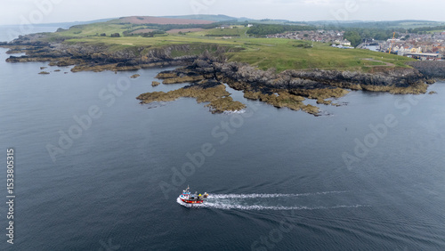 Fishing boat heading to haul creels 