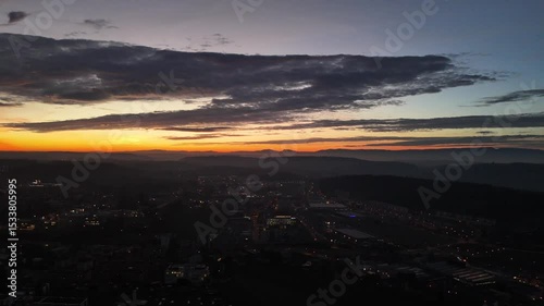 Sunset Aerial View of Fribourg Area with City Lights, Switzerland

