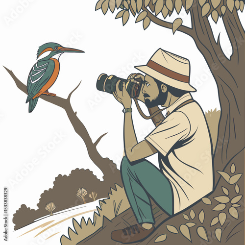 Wildlife photographer taking a picture of a kingfisher bird in nature