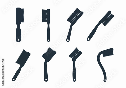 Various black hair cleaning combs in different positions
