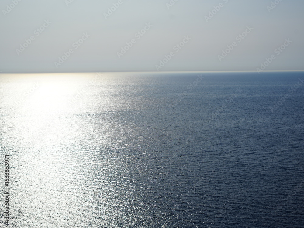 Fototapeta premium Tranquil seascape with distant mountain range seen from Zakynthos, Greece