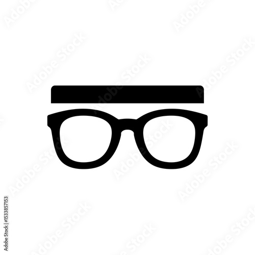 Stylish eyeglasses resting on a table, with a blurred background showcasing a cozy cafe atmosphere