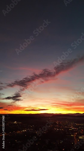 Sunset Aerial View of Fribourg Area with City Lights, Switzerland
