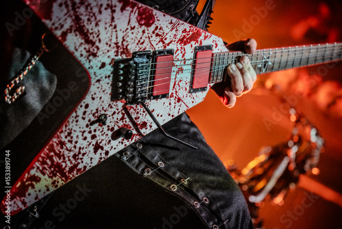 Guitarist playing a solo on an electric guitar