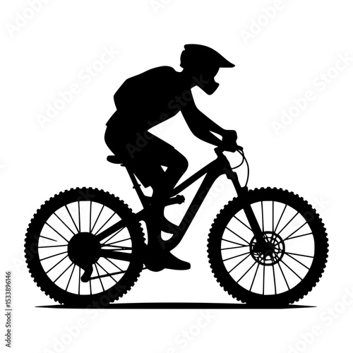 Silhouette of mountain biker on trail
