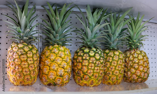 fresh pineapples in the display