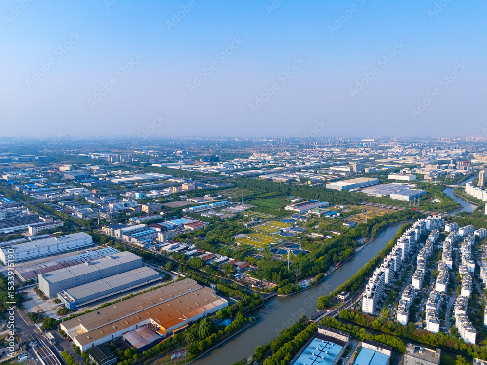 Obraz premium Aerial view of urban scenery in the suburbs, neatly planned factory parks, Qingpu central district, Shanghai.