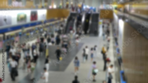 Wallpaper Mural out of focus blur top down view to passengers traveller walking on subway platform station after get off the train commuter in rush hour business time or ready to board the train.public transportation Torontodigital.ca