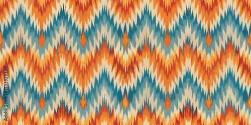 Vibrant zigzag pattern in orange, blue, and cream tones, perfect for textile design.