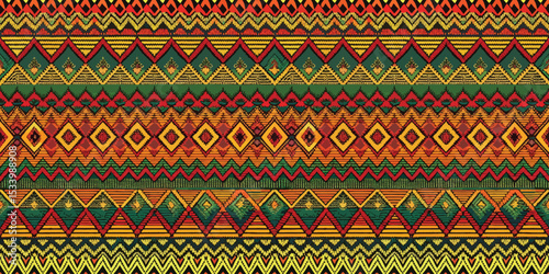 Colorful ethnic geometric pattern showcasing vibrant reds, greens, and yellows.