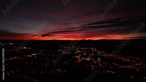 Sunset Aerial View of Fribourg Area with City Lights, Switzerland

