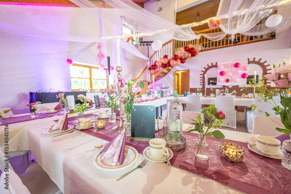 Fototapeta premium Wedding decor. Close up of a wedding table decoration with white and pink flowers and candles Wedding floristic concept