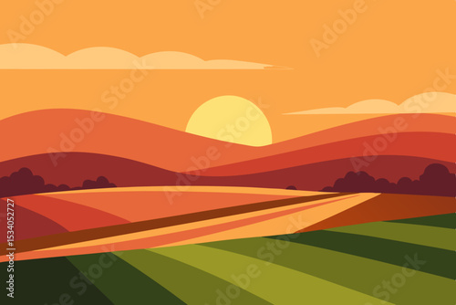  sunset glow on farmland fields with distant hills