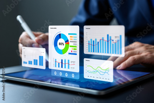 Businessman Analyzing Financial Data on Digital Tablet