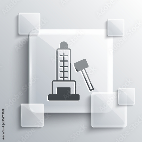 Grey High striker attraction with big hammer icon isolated on grey background. Attraction for measuring strength. Amusement park. Square glass panels. Vector