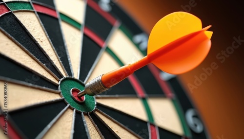 Close-up dart hitting bullseye on dartboard. Orange dart, accurate hit. Focus on target. Competition, sport, recreation. Success, achievement concept.