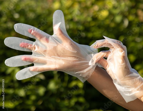 white transparent gloves on hands.