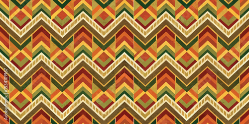 Vibrant zigzag pattern in earthy tones of yellow, orange, and green.