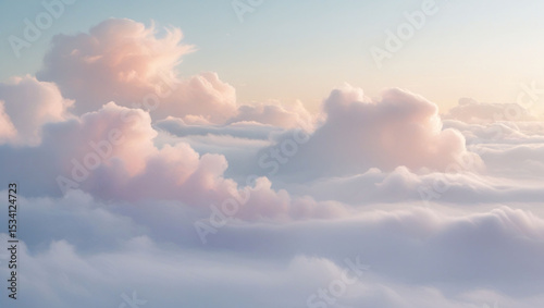 Aerial view of soft pastel clouds illuminated by sunlight creating a dreamy and ethereal atmosphere