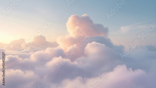 Dreamy view of fluffy clouds with soft pastel colors in a serene sky during golden hour light