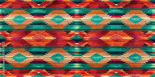 Colorful geometric pattern in shades of red, teal, and orange.
