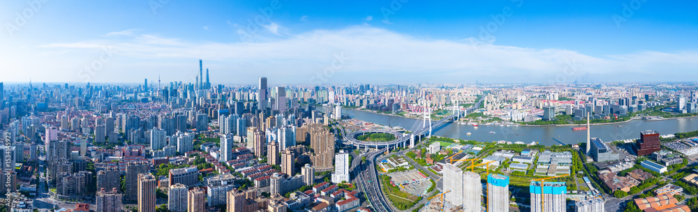 Obraz premium Aerial view of NanPu Bridge and Huangpu river on sunny day, Shanghai.
