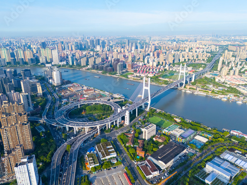 Aerial view of NanPu Bridge and Huangpu river on sunny day, Shanghai.