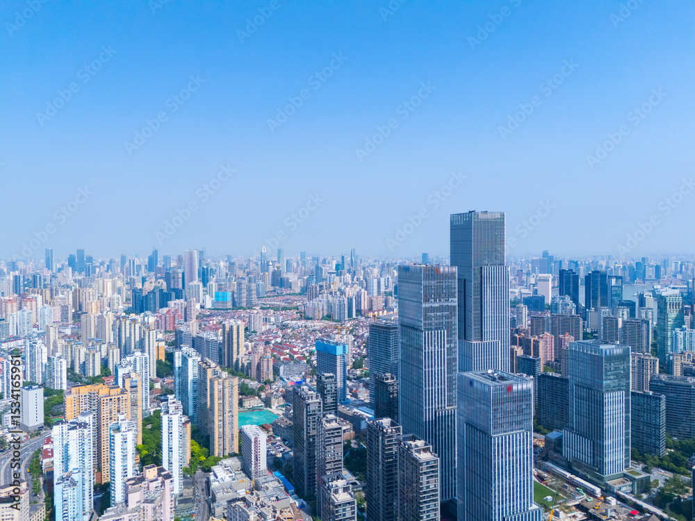 Obraz premium Aerial view of Shanghai skyscraper in downtown with blue sky background.