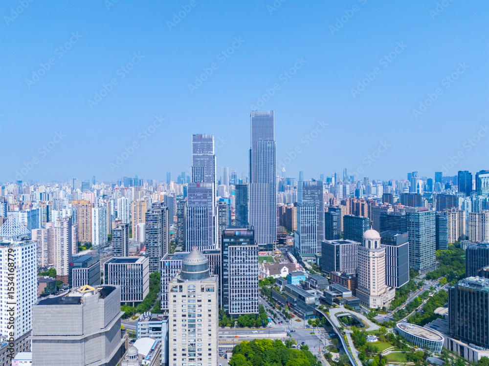 Fototapeta premium Aerial view of Shanghai skyscraper in downtown with blue sky background.