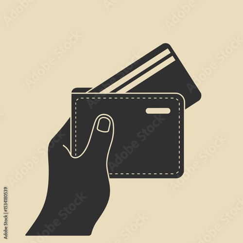 Hand holding wallet with credit cards against beige background  