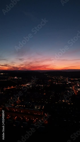 Sunset Aerial View of Fribourg Area with City Lights, Switzerland
