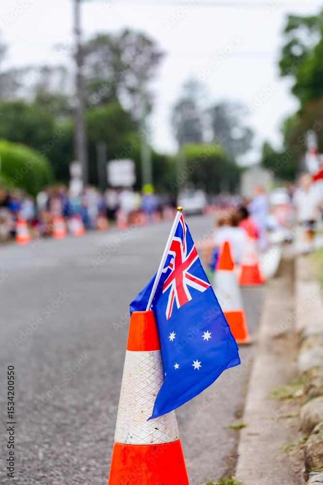 Australian flag along street for ANZAC day parade march Australian flag along street for ANZAC day parade march