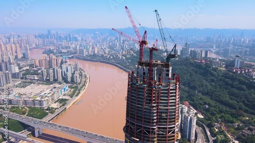 Aerial view of chongqing land and sea international center landmark building construction site on a sunny day