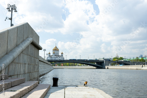 Photography A view of the Moskva River with a stone embankment