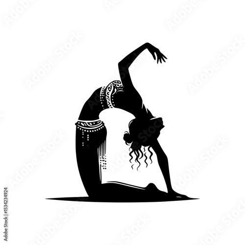 Silhouette of a belly dancer in a backbend pose