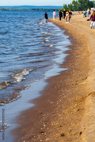 view of the Volga river on the embankment of the city of Samara, Russia, city beach and random people