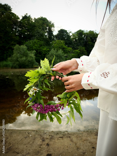 Midsummer solstice holiday with flower wreath