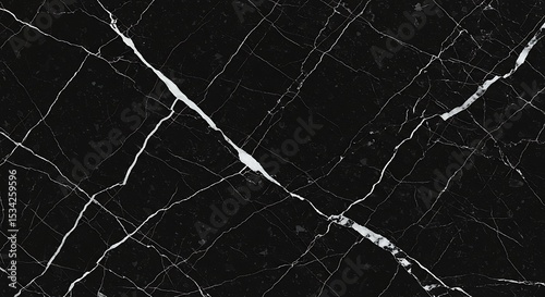 Elegant black marble surface with seamless white veining, ideal for luxury interiors, modern design backdrops, and product presentations.