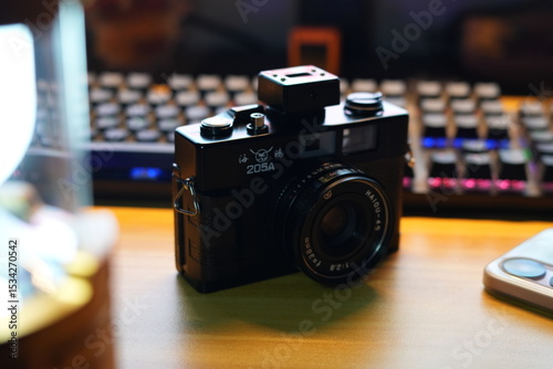 old camera on a wooden table