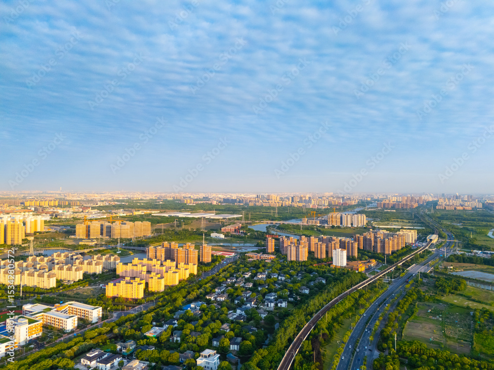 Fototapeta premium aerial view of urban scenery in the suburbs at sunset, Shanghai.
