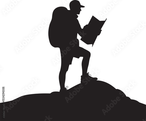Silhouette of hiker standing on a hill reading a map exploring the mountains