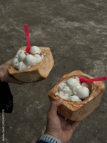 Couple women holding ice cream