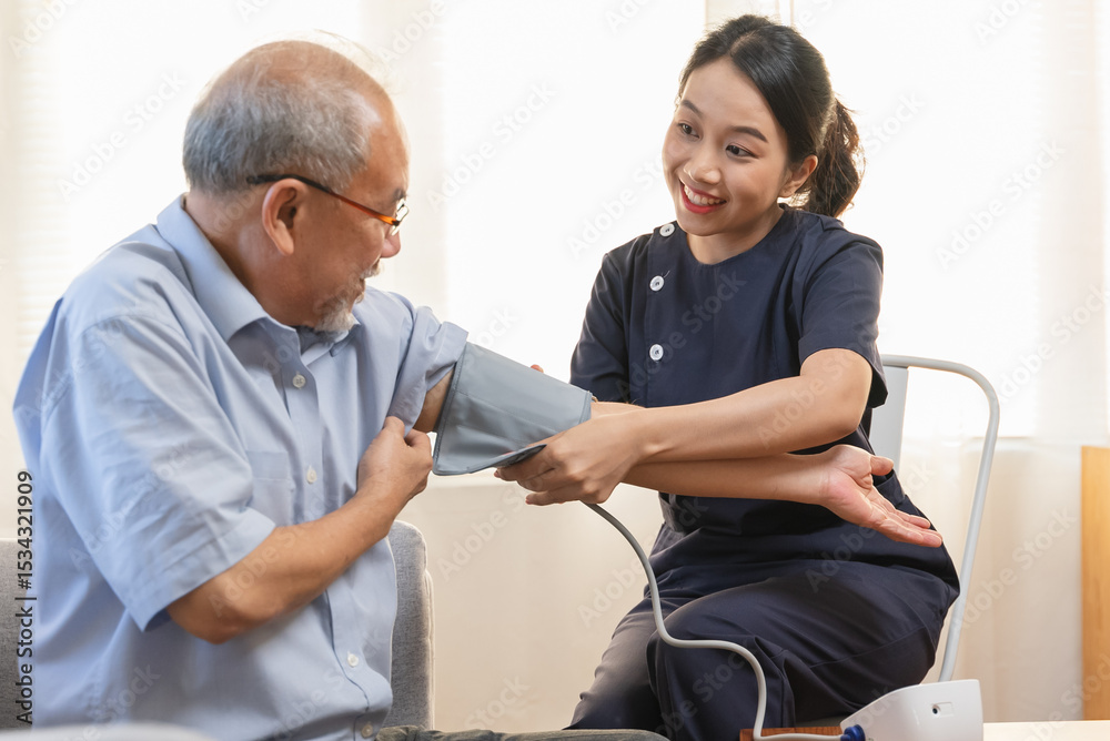 Obraz premium Nurse care service for retirement people, professional female caregiver measuring blood pressure senior man at home.