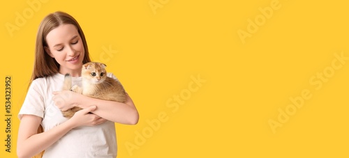 Young woman and cute kitten...
