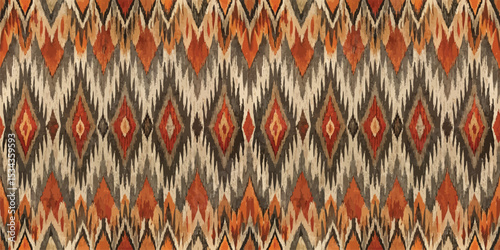 Intricate patterned textile featuring warm tones and geometric designs.