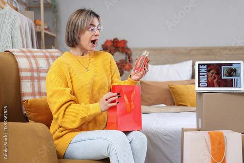 Surprised young woman with ...