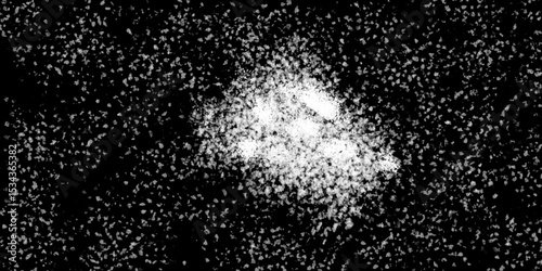 Snowflakes on dark background. white icy snowflakes isolated on black background, natural background. white crystalline powder on a black background. sugar dust. texture, pattern and clipping.